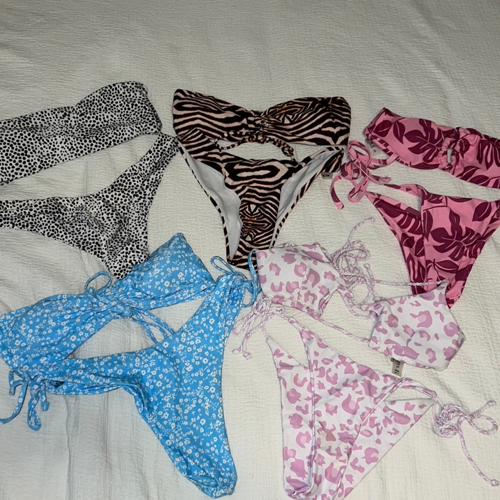 5 bathing suits. All size XS.